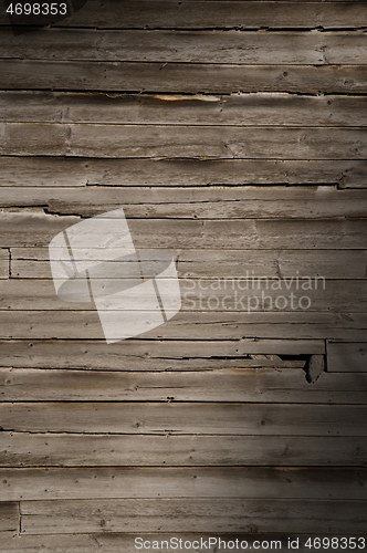 Image of Weathered wooden wall with unpainted planks