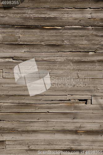 Image of Weathered wooden wall with unpainted planks