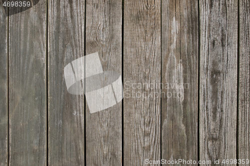 Image of Weathered wooden planking background texture