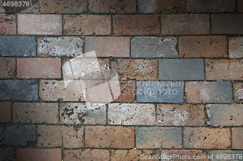 Image of Multi-colored brick work texture lit diagonally
