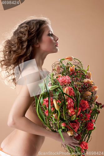 Image of Young Woman With Flowers