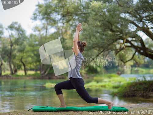 Image of woman meditating and doing yoga exercise