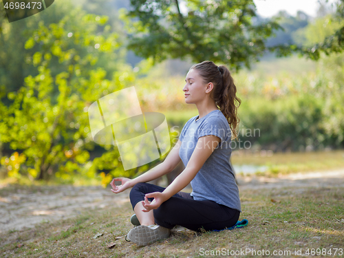 Image of woman meditating and doing yoga exercise
