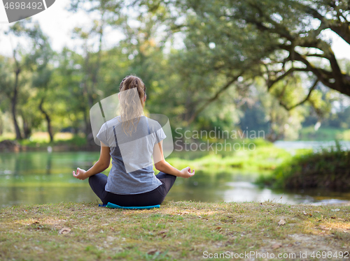 Image of woman meditating and doing yoga exercise