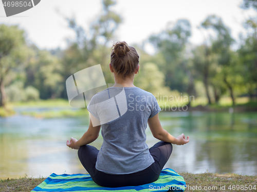 Image of woman meditating and doing yoga exercise