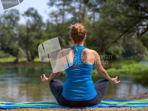 Image of woman meditating and doing yoga exercise