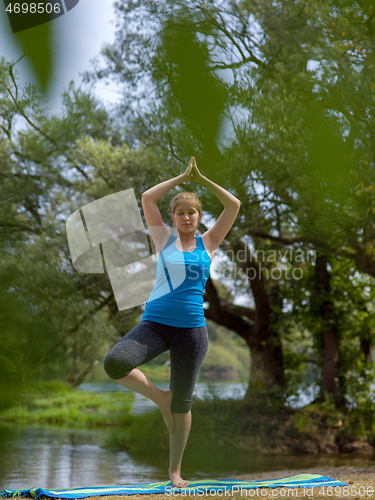 Image of woman meditating and doing yoga exercise