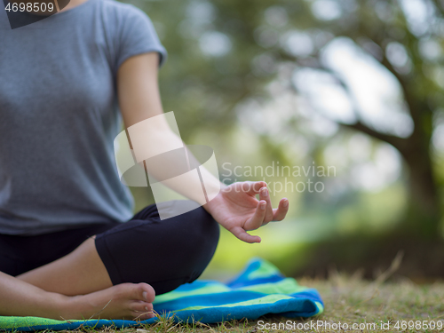 Image of woman meditating and doing yoga exercise
