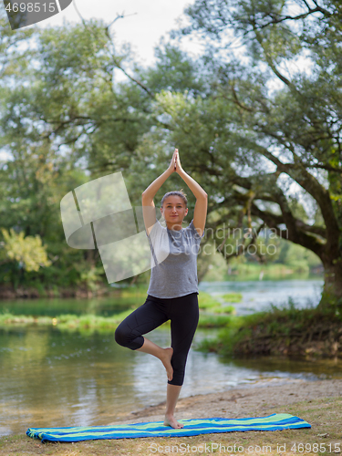 Image of woman meditating and doing yoga exercise