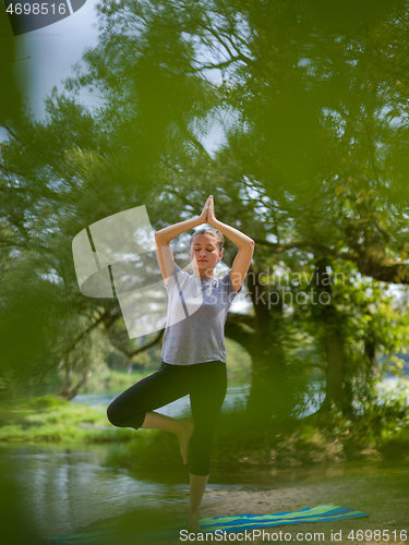 Image of woman meditating and doing yoga exercise