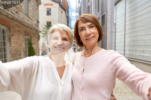 Image of senior women or friends taking selfie in tallinn