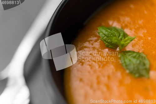 Image of close up of vegetable pumpkin cream soup in bowl