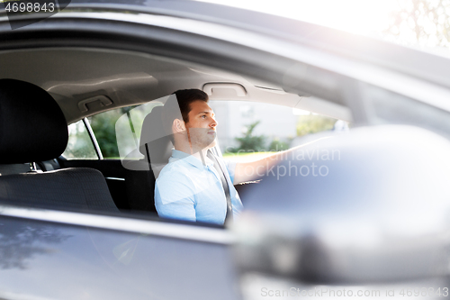 Image of man or driver driving car in summer