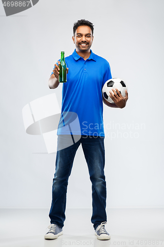 Image of indian male football fan with soccer ball and beer