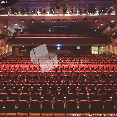 Image of Interior of modern empty red congress hall