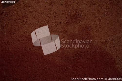 Image of Background texture of a red wall with faded paint