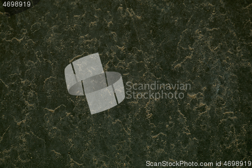 Image of Marbled mottled dark green background texture