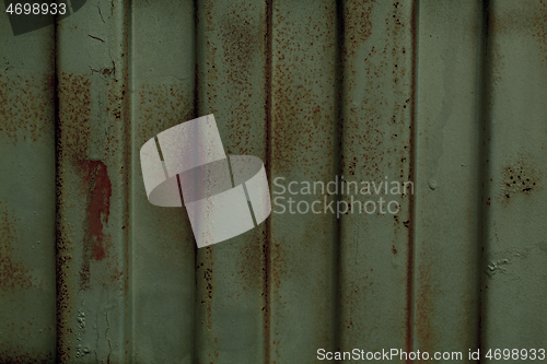 Image of Rusty decorative metal panel in a full frame view