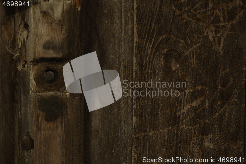 Image of Background texture of old wood with a bolt