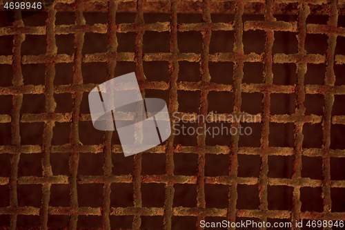 Image of Old rusted metal grid background texture