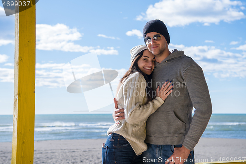 Image of Couple chating and having fun at beach bar