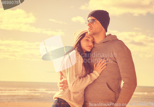 Image of Couple chating and having fun at beach bar