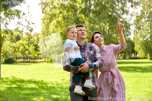 Image of happy family at summer park