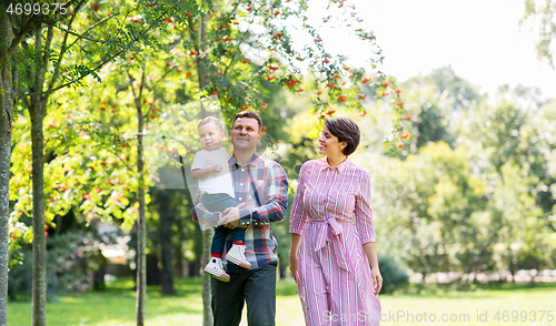 Image of happy family at summer park