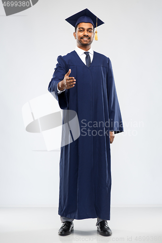 Image of graduate student in mortar board and bachelor gown