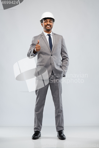 Image of indian male architect in helmet showing thumbs up