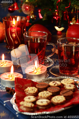 Image of Hot drink with Christmas cookies