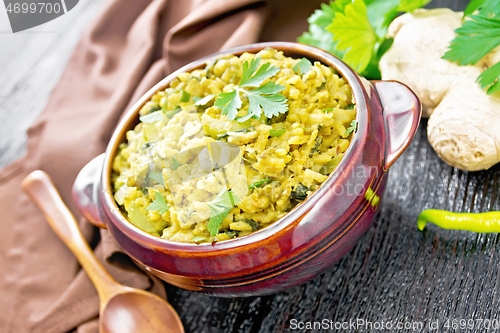 Image of Kitchari in bowl on wooden board