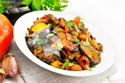 Image of Ragout with eggplant and pepper on light board