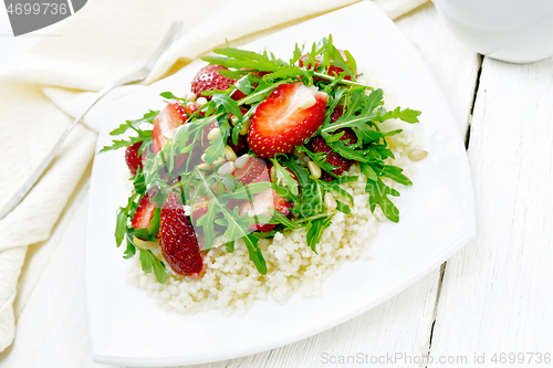 Image of Salad of strawberry and couscous on board