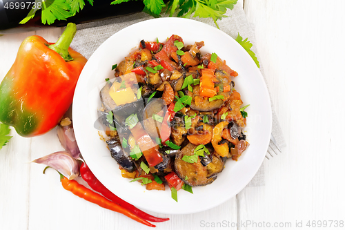 Image of Ragout with eggplant and pepper on board top