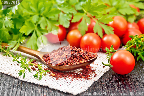 Image of Tomatoes dried in spoon on board