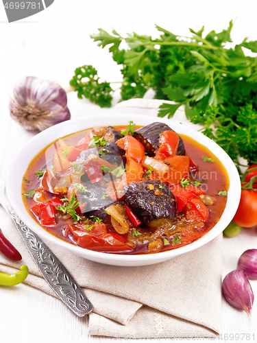 Image of Ragout vegetable with eggplant on wooden board