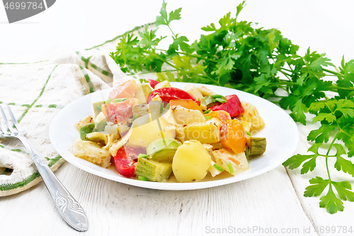 Image of Ragout vegetable with zucchini on board