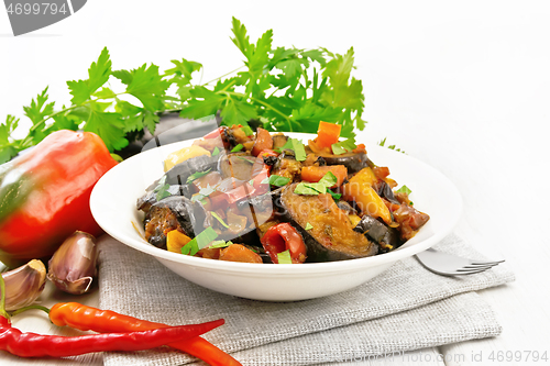 Image of Ragout with eggplant and pepper on white board