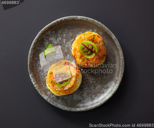 Image of toasted bread with salmon tartar