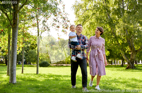 Image of happy family at summer park