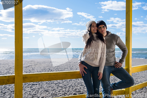 Image of Couple chating and having fun at beach bar