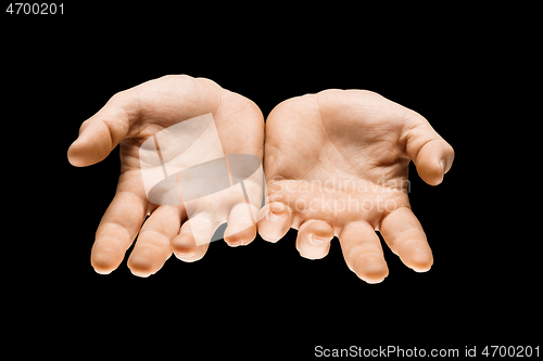 Image of Male hands demonstrating a gesture of getting touch isolated on gray background