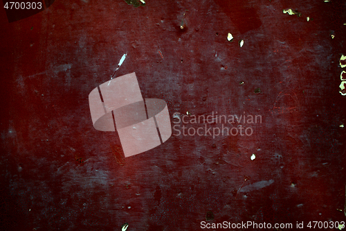 Image of Old dark red rusty metal panel background texture