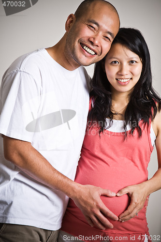 Image of Pregnant asian couple