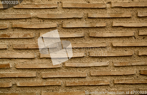 Image of Old brick wall background texture with long bricks