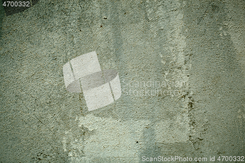 Image of Old weathered painted exterior green wall