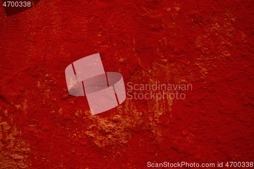 Image of Dark red background texture of a painted wall