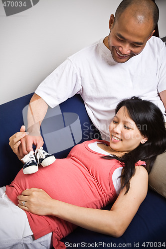 Image of Expecting asian couple