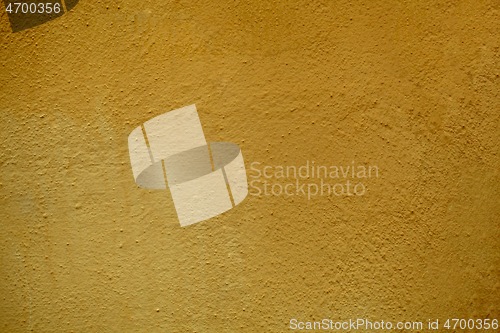 Image of Grungy dull brown painted wall background texture